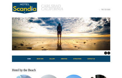 Hotel Scandia website featuring a surfer in a blue hoodie looking at the ocean